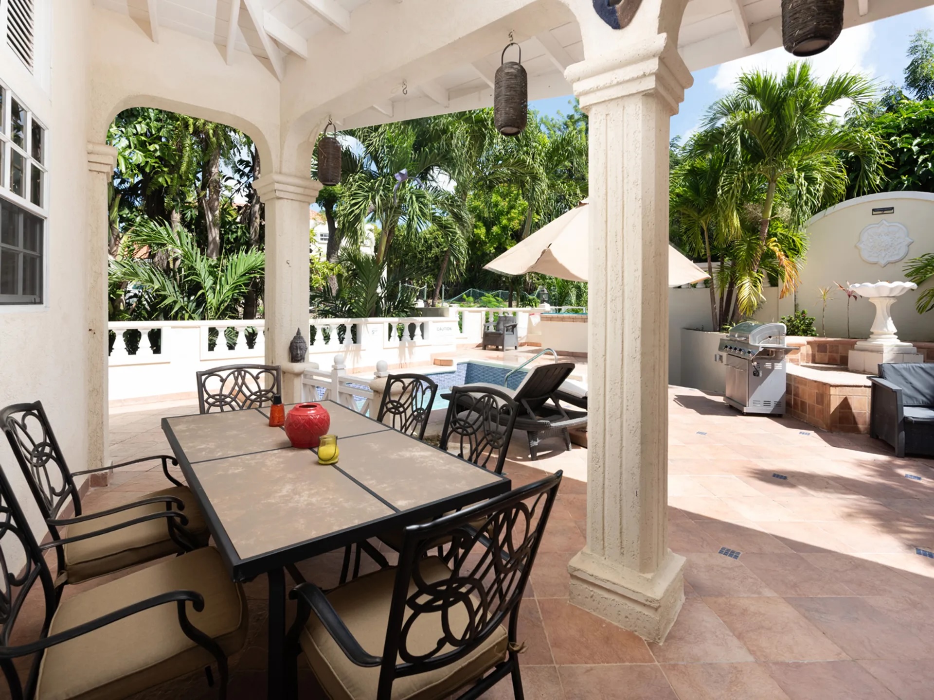 Apartment Four — covered dining terrace and pool